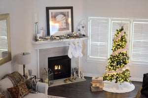 A cheery living room decorated for the holidays.